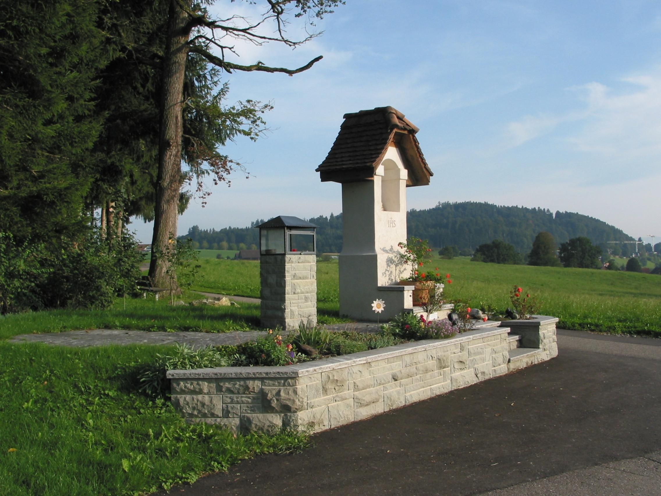 Laederach Gartenbau - Natursteinarbeit aus Sandstein - Gartenbau